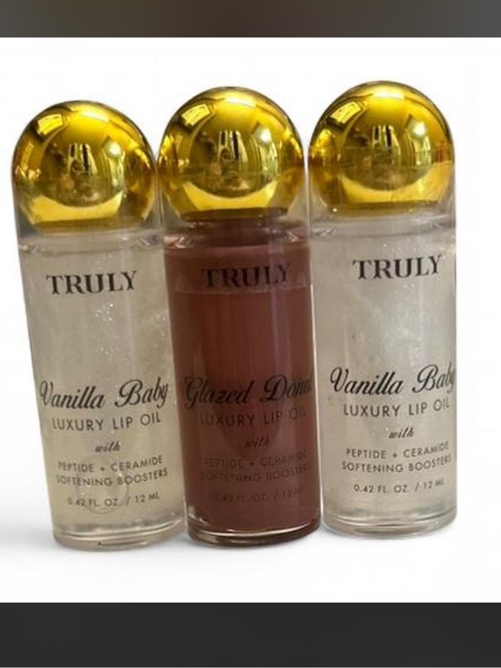 New/sealed TRULY Lip Oil Trio.